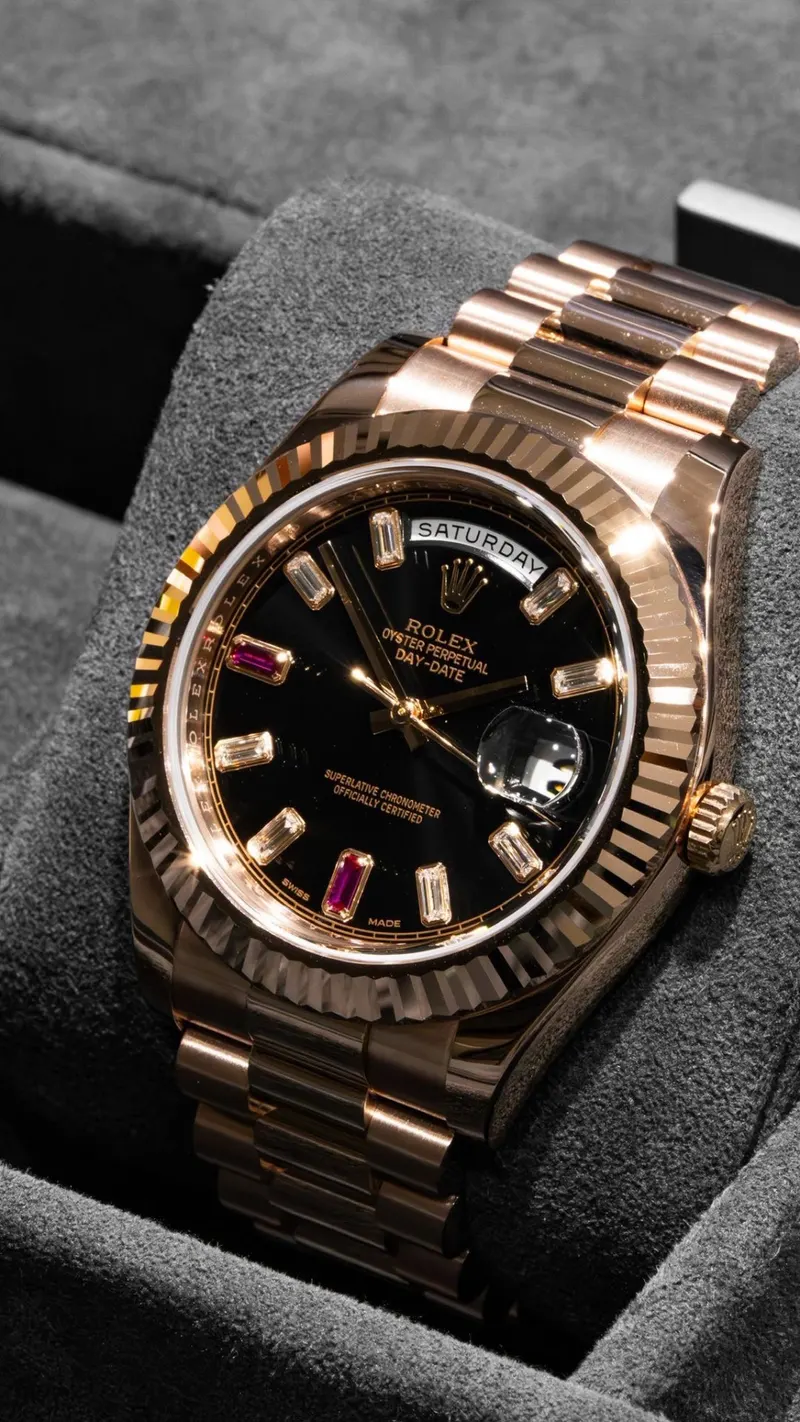 Rolex Day-Date 40 Everose Ruby & Diamond, Everose, Black dial with baguette diamond and ruby markers