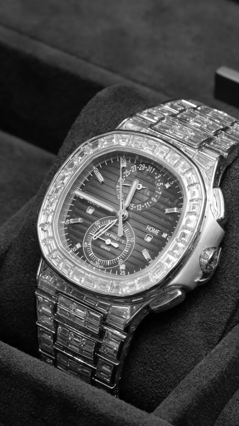 Patek Philippe Aquanaut Haute Joaillerie, White gold, Baguette diamond and sapphire dial, Rubber strap