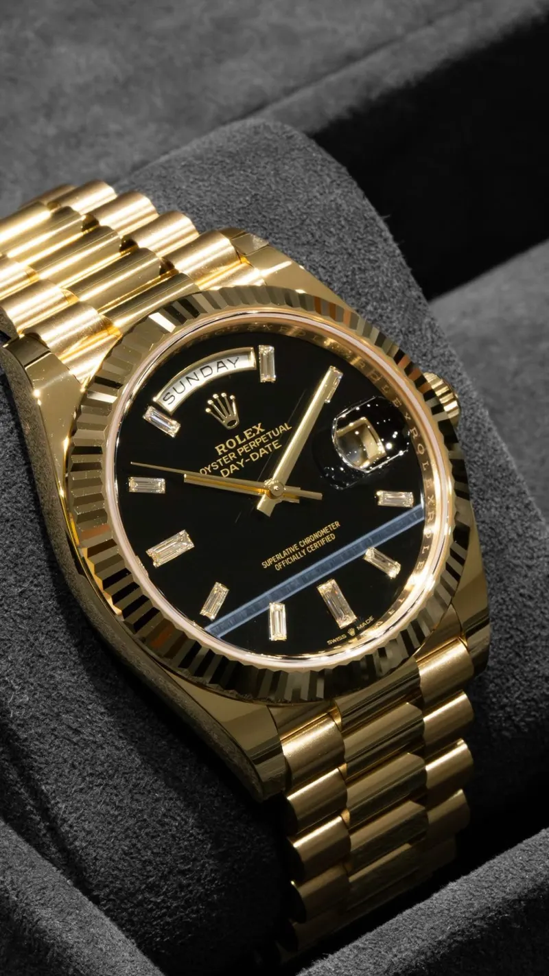 Rolex Day-Date 40 Onyx Baguette, Yellow gold, Onyx dial, Baguette-diamond markers, President